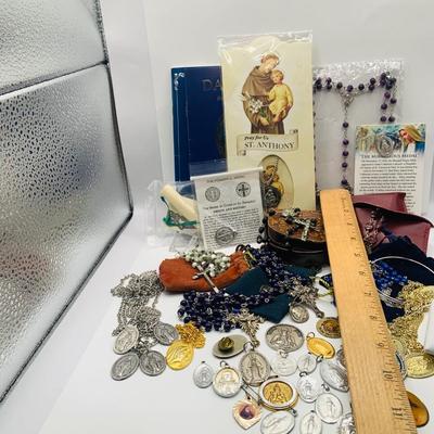 LOT 179: Collection of Rosery Beads, Saint Metals and More