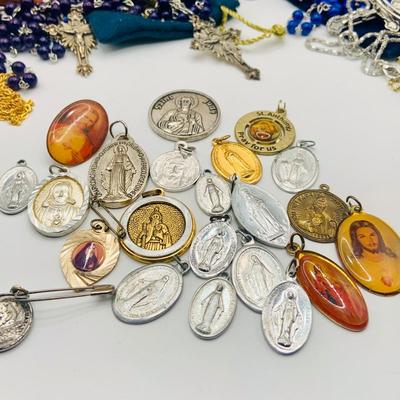LOT 179: Collection of Rosery Beads, Saint Metals and More