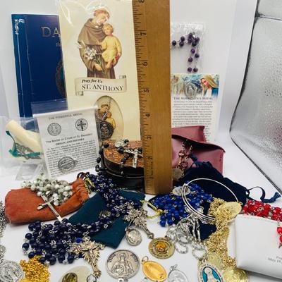 LOT 179: Collection of Rosery Beads, Saint Metals and More