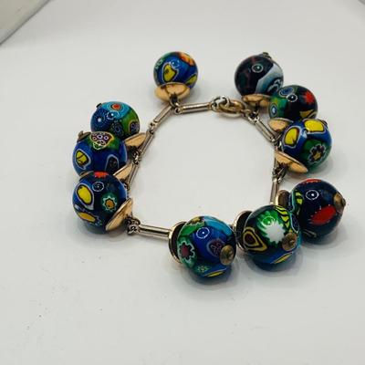 LOT:182: Collection of Fashion Jewelry Including 925 Bee Earings Silvertone Earrings and Necklas and Art Glass Beaded Bracelet