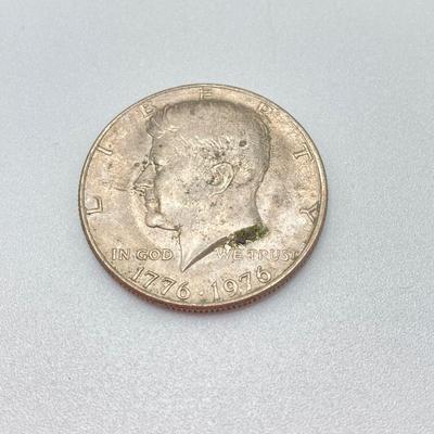 LOT 199J: Collection of US Coins - Three Kennedy Half Dollar Coins, One Gold Plated Susan B Anthony $1 Coin and One 1963 Roosevelt Dime...