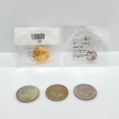 LOT 199J: Collection of US Coins - Three Kennedy Half Dollar Coins, One Gold Plated Susan B Anthony $1 Coin and One 1963 Roosevelt Dime...