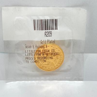 LOT 199J: Collection of US Coins - Three Kennedy Half Dollar Coins, One Gold Plated Susan B Anthony $1 Coin and One 1963 Roosevelt Dime...