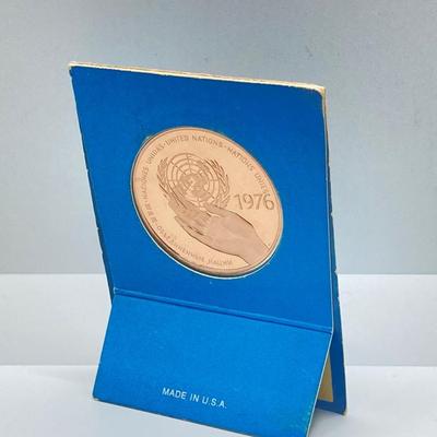 LOT 204J: 1492 - 1992 500 Quincentennial Coin in Round Wooden Box and 1976 United Nations Bronze Peace Medal