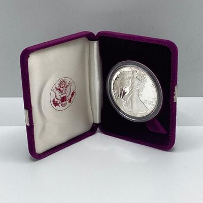LOT 207J: 1988 American Eagle One Ounce One Dollar Silver Coin with Certificate of Authenticity in Original Presentation Box