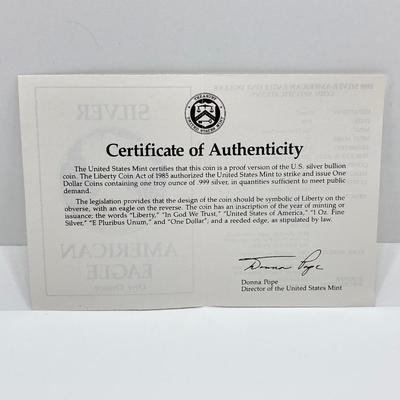 LOT 207J: 1988 American Eagle One Ounce One Dollar Silver Coin with Certificate of Authenticity in Original Presentation Box