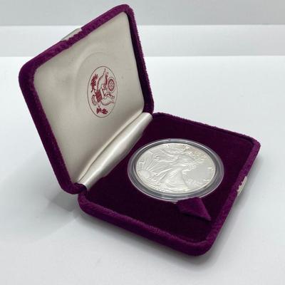 LOT 207J: 1988 American Eagle One Ounce One Dollar Silver Coin with Certificate of Authenticity in Original Presentation Box