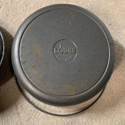 LOT 22 B: Lodge 6 & 7 (in box) Quart Dutch Ovens w/ Iron Covers