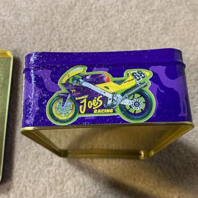 LOT 26 B: Collectible Tin Collection; Smokin' Joe's Racing, Enamel Footed Spinning Candy Tin, & More