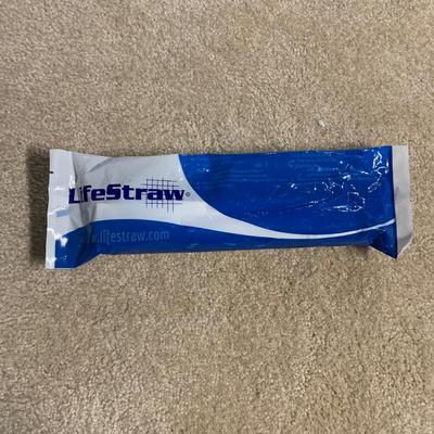 LOT 31 B: Camping Collection; Lifestraw, Travel Cooking Pots, Headlamp, Colman Thermos, Lanterns, 5 Gallon Water Pak, Cooler, Freeplay...