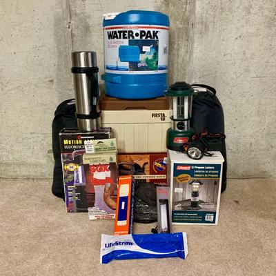 LOT 31 B: Camping Collection; Lifestraw, Travel Cooking Pots, Headlamp, Colman Thermos, Lanterns, 5 Gallon Water Pak, Cooler, Freeplay...