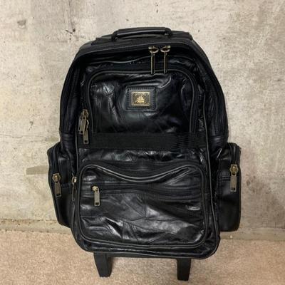 LOT 33 B: Pioneer Express Leather Travel Bag & Protégé Suitcase