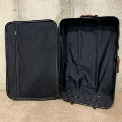LOT 34 B: American Tourister Suitcases