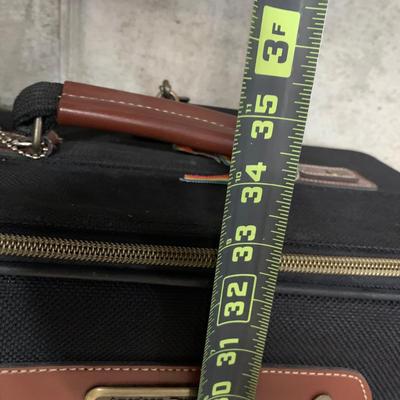 LOT 34 B: American Tourister Suitcases