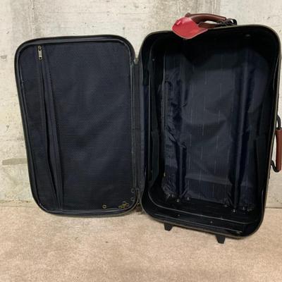 LOT 34 B: American Tourister Suitcases