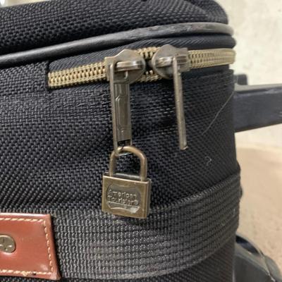 LOT 34 B: American Tourister Suitcases