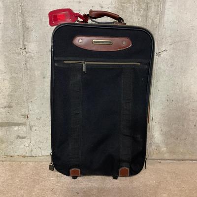 LOT 34 B: American Tourister Suitcases