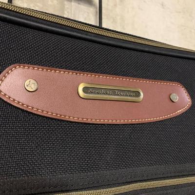 LOT 34 B: American Tourister Suitcases