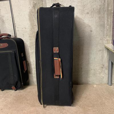 LOT 34 B: American Tourister Suitcases
