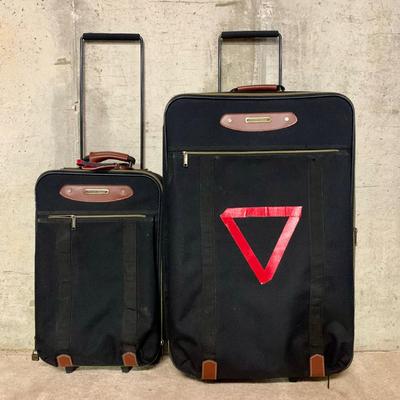 LOT 34 B: American Tourister Suitcases