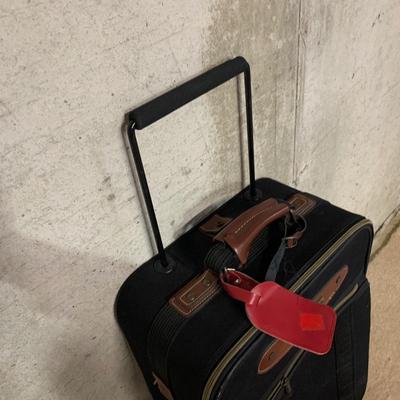 LOT 34 B: American Tourister Suitcases