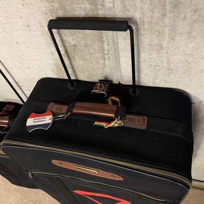 LOT 34 B: American Tourister Suitcases