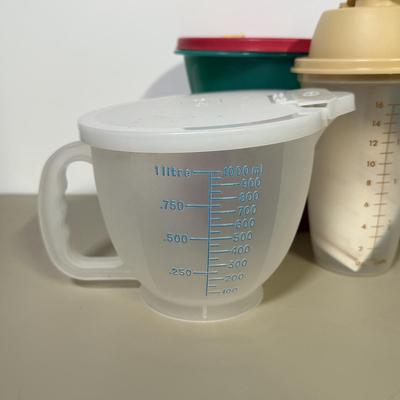 LOT 49B: Vintage Tupperware Collection - Containers, Measuring Cup, Key Hooks, Combs, Kids’ Lunchbox & Mo