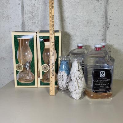 LOT 68B: Boxed Lamplight Farms Glass Oil Lamps, Anchor Hocking Glass Chimney Tops & 3 Bottles of Candle/Lamp Oil