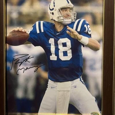 Peyton Manning signed photo. SCM authenticated