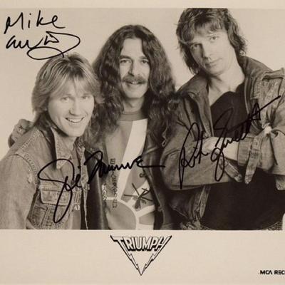 Triumph signed promo photo 
