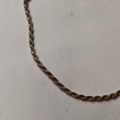 STERLING SILVER CHAIN BRACELET AND RING W/RED STONE THAT IS CHIPPED