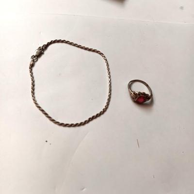 STERLING SILVER CHAIN BRACELET AND RING W/RED STONE THAT IS CHIPPED