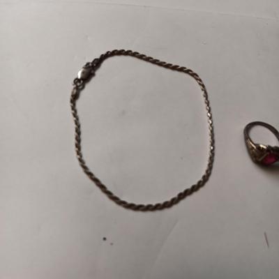 STERLING SILVER CHAIN BRACELET AND RING W/RED STONE THAT IS CHIPPED