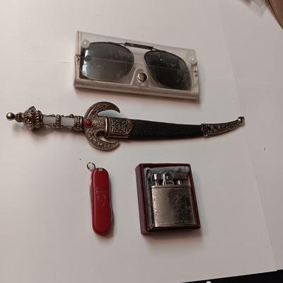 CLIP ON AVIATOR SUNGLASSES, SMALL DAGGER, SWISS ARMY KNIFE AND OLD LIGHTER