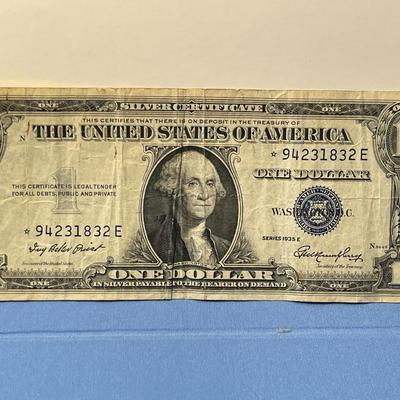 Series of 1935-E Heavily Circulated Condition Star Note Silver Certificate as Pictured. FREE DOMESTIC SHIPPING.