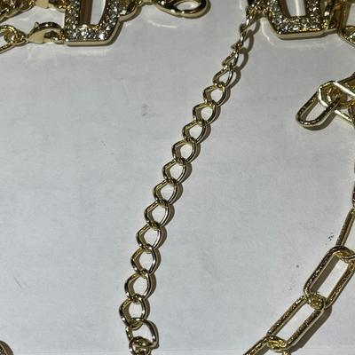 New Never Worn OPC Designer Triple Strand Gold-tone Necklace w/Rhinestone clasp Area in Very Good Condition as Pictured. (Jewelry #60).