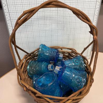 Basket of blue votive candle holders