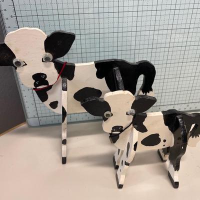 4 Wood cows in total