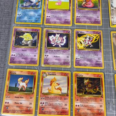 Lot of Pokémon Cards in Sleeves 