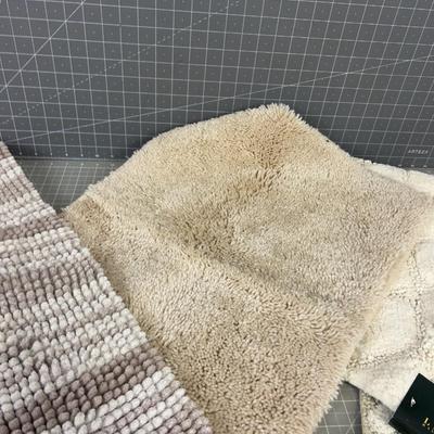 Several Bath Mats 