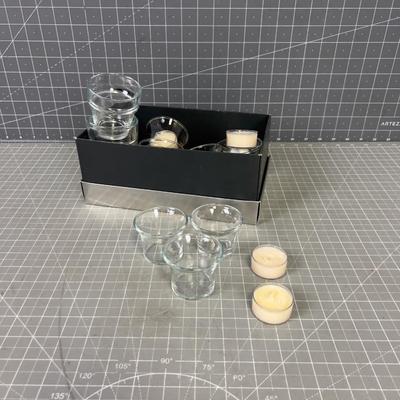 Pile of Clear Votives and Candles