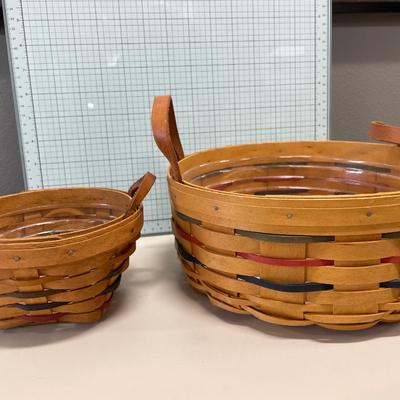 2 round Longaberger baskets with handles