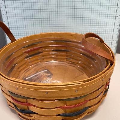 2 round Longaberger baskets with handles