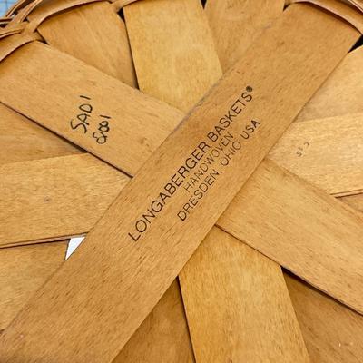 2 round Longaberger baskets with handles