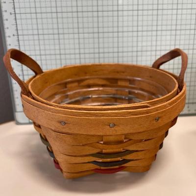 2 round Longaberger baskets with handles