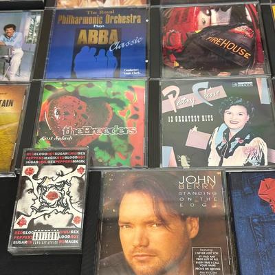 Collection of CDs and Tapes with 80s, 90s and early 2000s hits