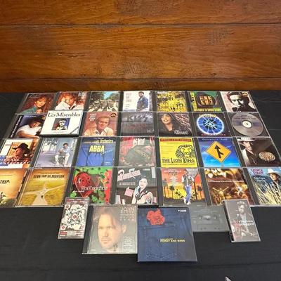 Collection of CDs and Tapes with 80s, 90s and early 2000s hits