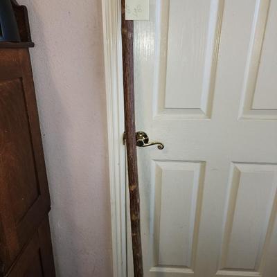 5 foot tall walking stick.