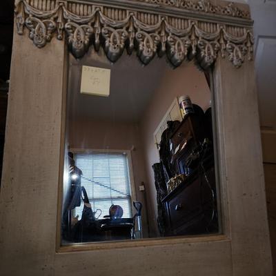 Hanging wall mirror.