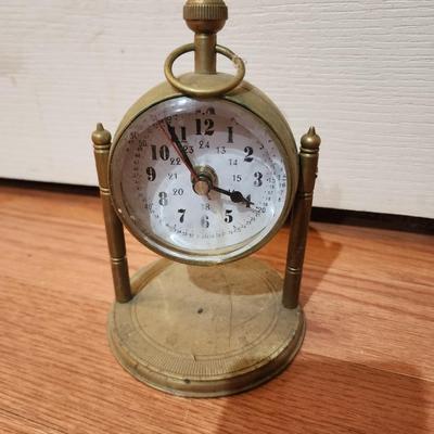 Brass clock.